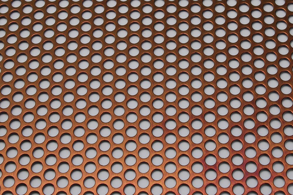 Eni_Bild_1_Edelstahl_gelocht-Rotgold.jpg Eni_Bild_1_Edelstahl_gelocht-Rotgold.jpg